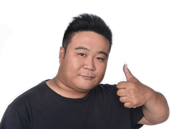 Asian man giving a thumbs up